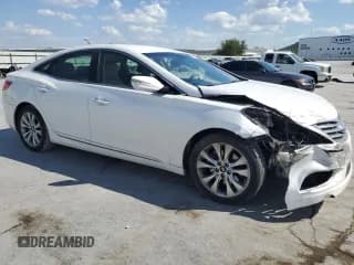 ✅ 2013 Hyundai Azera • VIN: KMHFG4JGXDA325761 • Лот: 70225975. Опубликован ранее на Copart с пробегом 126 944 миль. Бесплатный доступ к архиву аукционных продаж из США и подробный отчёт об истории автомобиля на DreamBid. Изображение 4.