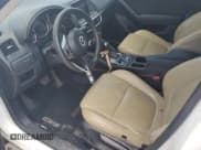 ✅ 2016 Mazda CX-5 Sport • VIN: JM3KE2BY7G0844630 • Lot: 69092095. Wystawiony na Copart z przebiegiem 162 663 mil. Bezpłatny archiwum sprzedaży aukcyjnych z USA i szczegółowy raport historii pojazdu na DreamBid. Zdjęcie 7.