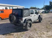 ✅ 2017 Jeep Wrangler Unlimited Sport • VIN: 1C4BJWDG1HL742689 • Lot: 92800245. Listed on Copart with 105,064 mi. Free auction sales archive from the USA and detailed vehicle history report at DreamBid. Image 4.