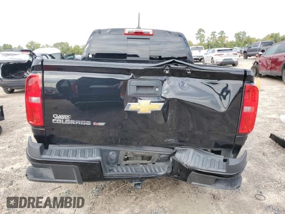 ✅ 2018 Chevrolet Colorado 2WD Z71 • VIN: 1GCGSDEN7J1295162 • Лот: 89855195. Опубликован ранее на Copart с пробегом 120 782 миль. Бесплатный доступ к архиву аукционных продаж из США и подробный отчёт об истории автомобиля на DreamBid. Изображение 6.