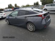 ✅ 2021 Toyota Prius LE • VIN: JTDKAMFU8M3139126 • Lot: 87396285. Listed on Copart with 243,893 mi. Free auction sales archive from the USA and detailed vehicle history report at DreamBid. Image 2.