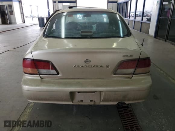 ✅ 1997 Nissan Maxima GXE • VIN: JN1CA21D1VT873935 • Lot: 70561535. Listed on Copart with 279,481 mi. Free auction sales archive from the USA and detailed vehicle history report at DreamBid. Image 6.