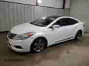 2013 Hyundai Azera с VIN KMHFH4JG7DA328842, выставлен на аукционе Copart как лот 49172895 с пробегом 171 046 миль миль и Чистый • Clean title. История ставок и продаж доступна на DreamBid. Изображение 1.