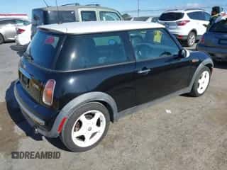 2002 MINI Hardtop with VIN WMWRC33402TC32985, listed as a IAAI auction lot 42608636 with 159,996 mi miles and . Bid and sale history available at DreamBid. Image 4.