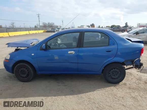 2006 Chevrolet Aveo LS z VIN KL1TD56696B543863, wystawiony jako IAAI lot #41446969 z przebiegiem 222 866 mil mil oraz . Historia ofert i sprzedaży dostępna na DreamBid. Obrazek 14.