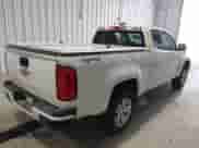 2020 Chevrolet Colorado 4WD LT z VIN 1GCHTCEA5L1181205, wystawiony jako IAAI lot #42353064 z przebiegiem 74 945 mil mil oraz . Historia ofert i sprzedaży dostępna na DreamBid. Obrazek 4.