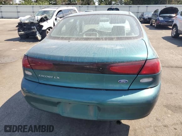 ✅ 1997 Ford Escort LX • VIN: 1FALP13P2VW303895 • Lot: 80337765. Wystawiony na Copart z przebiegiem 116 566 mil. Bezpłatny archiwum sprzedaży aukcyjnych z USA i szczegółowy raport historii pojazdu na DreamBid. Zdjęcie 6.