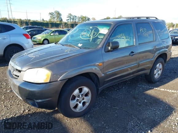 ✅ 2003 Mazda Tribute LX • VIN: 4F2CZ94133KM52401 • Лот: 42142297. Опубликован ранее на IAAI с пробегом Не указан. Бесплатный доступ к архиву аукционных продаж из США и подробный отчёт об истории автомобиля на DreamBid. Изображение 2.