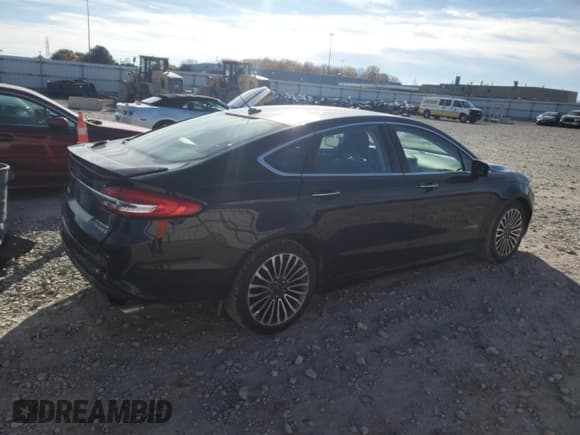 ✅ 2017 Ford Fusion Hybrid Titanium • VIN: 3FA6P0RU8HR113952 • Lot: 89856085. Wystawiony na Copart z przebiegiem Nie podano. Bezpłatny archiwum sprzedaży aukcyjnych z USA i szczegółowy raport historii pojazdu na DreamBid. Zdjęcie 3.