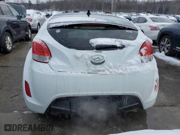 2012 Hyundai Veloster w/Red Int z VIN KMHTC6AD5CU030340, wystawiony jako Copart lot #45793405 z przebiegiem 139 667 mil mil oraz Czysty tytuł • Clean title. Historia ofert i sprzedaży dostępna na DreamBid. Obrazek 6.