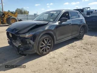 ✅ 2018 Mazda CX-5 Grand Touring • VIN: JM3KFBDM1J0372391 • Lot: 91133005. Wystawiony na Copart z przebiegiem 119 967 mil. Bezpłatny archiwum sprzedaży aukcyjnych z USA i szczegółowy raport historii pojazdu na DreamBid. Zdjęcie 1.