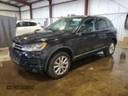 ✅ 2013 Volkswagen Touareg Lux • VIN: WVGEF9BP7DD007945 • Lot: 65758255. Listed on Copart with 90,086 mi. Free auction sales archive from the USA and detailed vehicle history report at DreamBid. Image 1.