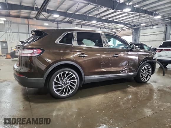 ✅ 2019 Lincoln Nautilus Reserve • VIN: 2LMPJ8L97KBL25122 • Лот: 67236405. Опубликован ранее на Copart с пробегом 74 654 миль. Бесплатный доступ к архиву аукционных продаж из США и подробный отчёт об истории автомобиля на DreamBid. Изображение 3.