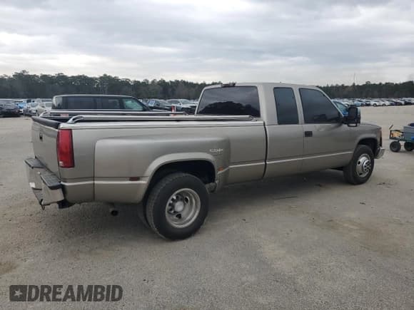 ✅ 1999 Chevrolet Silverado 3500 • VIN: 1GBHC39FXXF077473 • Lot: 49597355. Listed on Copart with 119,287 mi. Free auction sales archive from the USA and detailed vehicle history report at DreamBid. Image 3.
