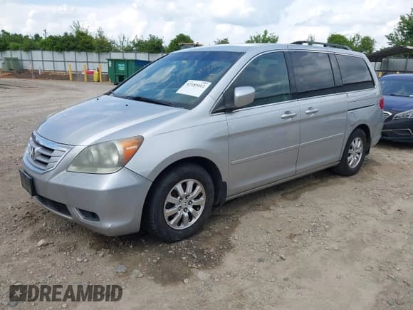✅ 2010 Honda Odyssey EX • VIN: 5FNRL3H49AB023447 • Lot: 42185412. Listed on IAAI with 215,317 mi. Free auction sales archive from the USA and detailed vehicle history report at DreamBid. Image 2.