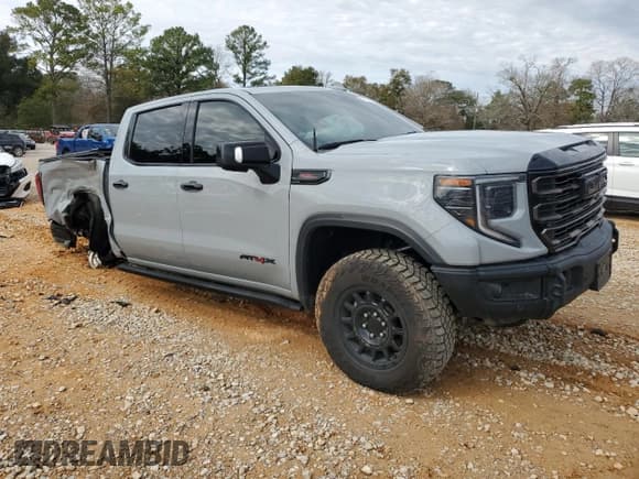 ✅ 2024 GMC Sierra 1500 AT4X • VIN: 3GTUUFEL0RG152378 • Лот: 42332975. Опубликован ранее на Copart с пробегом 34 277 миль. Бесплатный доступ к архиву аукционных продаж из США и подробный отчёт об истории автомобиля на DreamBid. Изображение 4.