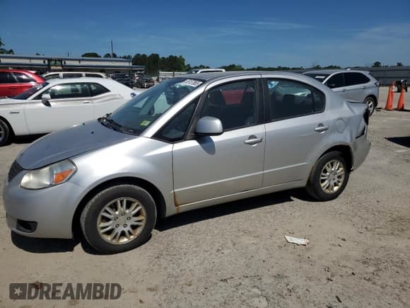 ✅ 2012 Suzuki SX4 LE • VIN: JS2YC5A37C6304921 • Lot: 55137865. Listed on Copart with 132,110 mi. Free auction sales archive from the USA and detailed vehicle history report at DreamBid. Image 1.