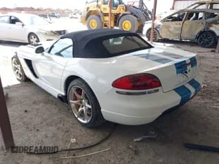 ✅ 2009 Dodge Viper SRT-10 • VIN: 1B3JZ65Z39V500286 • Lot: 41670434. Listed on IAAI with 120,854 mi. Free auction sales archive from the USA and detailed vehicle history report at DreamBid. Image 3.