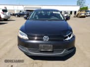 ✅ 2013 Volkswagen Jetta TDI w/Premium/Nav • VIN: 3VW3L7AJ7DM376098 • Lot: 65588905. Listed on Copart with 178,910 mi. Free auction sales archive from the USA and detailed vehicle history report at DreamBid. Image 5.