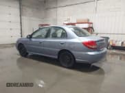 ✅ 2003 Kia Rio • VIN: KNADC125536274171 • Lot: 41986369. Wystawiony na IAAI z przebiegiem 59 837 mil. Bezpłatny archiwum sprzedaży aukcyjnych z USA i szczegółowy raport historii pojazdu na DreamBid. Zdjęcie 3.