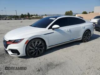 ✅ 2020 Volkswagen Arteon SEL R-Line • VIN: WVWSR7AN3LE012250 • Лот: 64891575. Опубликован ранее на Copart с пробегом 50 709 миль. Бесплатный доступ к архиву аукционных продаж из США и подробный отчёт об истории автомобиля на DreamBid. Изображение 1.