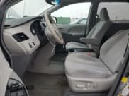 ✅ 2012 Toyota Sienna LE • VIN: 5TDKK3DC1CS232617 • Lot: 93100015. Listed on Copart with 93,071 mi. Free auction sales archive from the USA and detailed vehicle history report at DreamBid. Image 7.