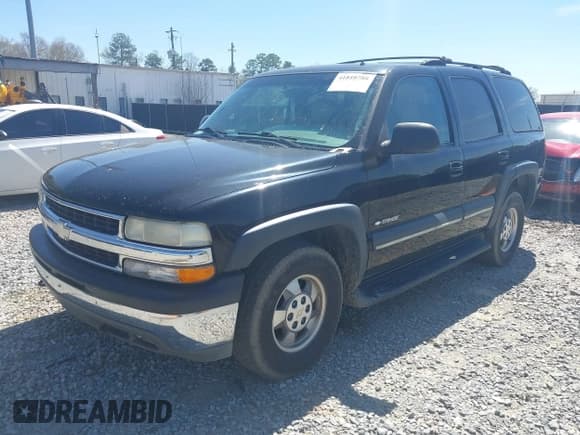 ✅ 2002 Chevrolet Tahoe LT • VIN: 1GNEC13Z42R245581 • Lot: 41810788. Listed on IAAI with 228,166 mi. Free auction sales archive from the USA and detailed vehicle history report at DreamBid. Image 2.