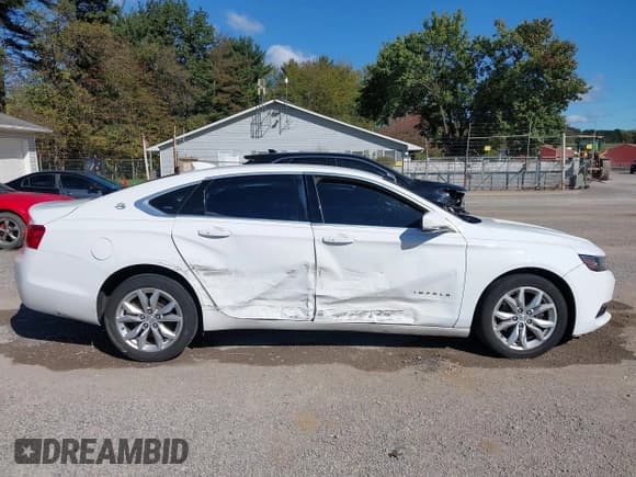 ✅ 2018 Chevrolet Impala LT • VIN: 2G1105S37J9152947 • Lot: 43446256. Wystawiony na IAAI z przebiegiem 103 017 mil. Bezpłatny archiwum sprzedaży aukcyjnych z USA i szczegółowy raport historii pojazdu na DreamBid. Zdjęcie 13.