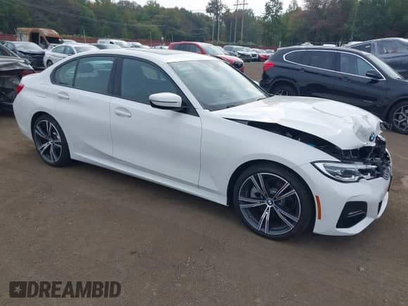 2020 BMW 3 Series 330i xDrive z VIN 3MW5R7J04L8B19857, wystawiony jako IAAI lot #43293574 z przebiegiem 19 853 mil mil oraz . Historia ofert i sprzedaży dostępna na DreamBid. Obrazek 1.