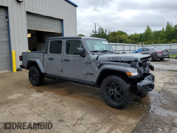 ✅ 2021 Jeep Gladiator Sport S • VIN: 1C6HJTAG1ML599287 • Lot: 71597864. Listed on Copart with 23,186 mi. Free auction sales archive from the USA and detailed vehicle history report at DreamBid. Image 4.