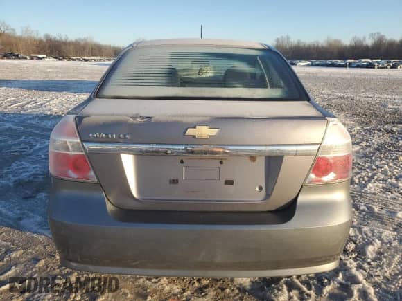 2009 Chevrolet Aveo 1LT z VIN KL1TD56E39B608752, wystawiony jako Copart lot #43245865 z przebiegiem 140 707 mil mil oraz Szkoda całkowita • Salvage title. Historia ofert i sprzedaży dostępna na DreamBid. Obrazek 6.