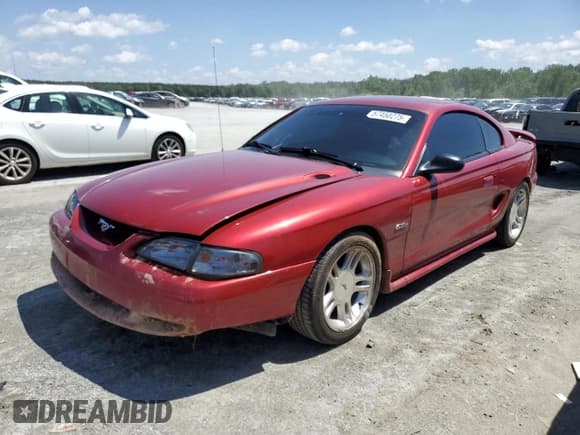 ✅ 1998 Ford Mustang GT • VIN: 1FAFP42X2WF169410 • Lot: 57450275. Listed on Copart with 196,606 mi. Free auction sales archive from the USA and detailed vehicle history report at DreamBid. Image 1.