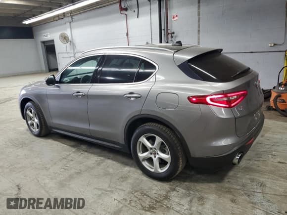 ✅ 2018 Alfa Romeo Stelvio • VIN: ZASFAKAN7J7C01195 • Lot: 82287485. Listed on Copart with 62,431 mi. Free auction sales archive from the USA and detailed vehicle history report at DreamBid. Image 2.
