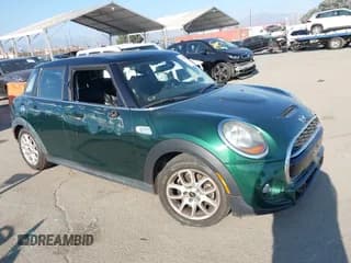 ✅ 2015 MINI Hardtop 4 Door S • VIN: WMWXU3C54F2B57300 • Lot: 43345403. Wystawiony na IAAI z przebiegiem 33 913 mil. Bezpłatny archiwum sprzedaży aukcyjnych z USA i szczegółowy raport historii pojazdu na DreamBid. Zdjęcie 1.