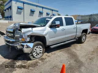 2017 Chevrolet Silverado 2500HD LTZ с VIN 1GC1KWEYXHF223591, выставлен на аукционе Copart как лот 69821195 с пробегом 199 031 миль миль и Списание • Salvage title. История ставок и продаж доступна на DreamBid. Изображение 1.