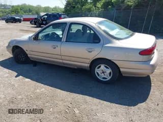 ✅ 1999 Ford Contour LX • VIN: 1FAFP653XXK134482 • Lot: 42224788. Wystawiony na IAAI z przebiegiem 92 501 mil. Bezpłatny archiwum sprzedaży aukcyjnych z USA i szczegółowy raport historii pojazdu na DreamBid. Zdjęcie 3.