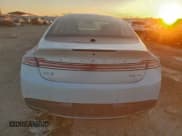 ✅ 2017 Lincoln MKZ Reserve • VIN: 3LN6L5F92HR602197 • Lot: 94865225. Wystawiony na Copart z przebiegiem 63 805 mil. Bezpłatny archiwum sprzedaży aukcyjnych z USA i szczegółowy raport historii pojazdu na DreamBid. Zdjęcie 6.