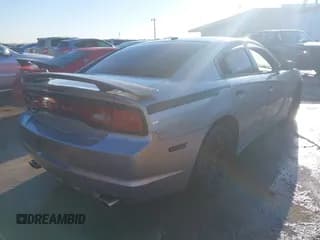 ✅ 2014 Dodge Charger SXT • VIN: 2C3CDXHG2EH239214 • Lot: 43595966. Wystawiony na IAAI z przebiegiem 219 931 mil. Bezpłatny archiwum sprzedaży aukcyjnych z USA i szczegółowy raport historii pojazdu na DreamBid. Zdjęcie 4.