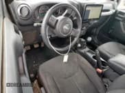 ✅ 2016 Jeep Wrangler Black Bear • VIN: 1C4AJWAG9GL100784 • Lot: 59625495. Wystawiony na Copart z przebiegiem 62 481 mil. Bezpłatny archiwum sprzedaży aukcyjnych z USA i szczegółowy raport historii pojazdu na DreamBid. Zdjęcie 8.