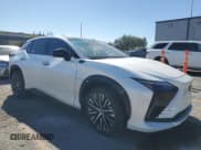 ✅ 2023 Lexus RZ 450e Luxury • VIN: JTJAAAAB5PA018325 • Lot: 89526415. Listed on Copart with 21,691 mi. Free auction sales archive from the USA and detailed vehicle history report at DreamBid. Image 4.
