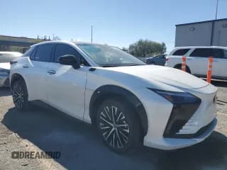 ✅ 2023 Lexus RZ 450e Luxury • VIN: JTJAAAAB5PA018325 • Lot: 89526415. Listed on Copart with 21,691 mi. Free auction sales archive from the USA and detailed vehicle history report at DreamBid. Image 4.