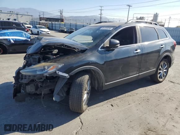 ✅ 2015 Mazda CX-9 Grand Touring • VIN: JM3TB2DV7F0468784 • Lot: 91723295. Listed on Copart with Not provided. Free auction sales archive from the USA and detailed vehicle history report at DreamBid. Image 1.