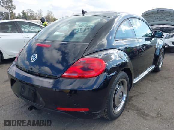 ✅ 2013 Volkswagen Beetle Fender Edition • VIN: 3VWJP7ATXDM622350 • Lot: 41503396. Listed on IAAI with 55,468 mi. Free auction sales archive from the USA and detailed vehicle history report at DreamBid. Image 4.