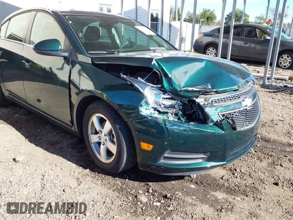 ✅ 2014 Chevrolet Cruze 1LT • VIN: 1G1PC5SB3E7185136 • Lot: 43482848. Listed on IAAI with 34,370 mi. Free auction sales archive from the USA and detailed vehicle history report at DreamBid. Image 6.