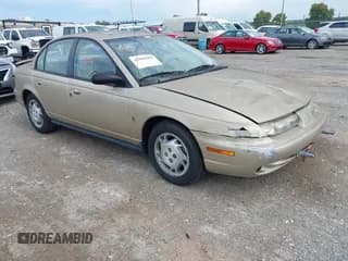 ✅ 1997 Saturn SL • VIN: 1G8ZK5277VZ372702 • Lot: 42969604. Wystawiony na IAAI z przebiegiem 86 720 mil. Bezpłatny archiwum sprzedaży aukcyjnych z USA i szczegółowy raport historii pojazdu na DreamBid. Zdjęcie 1.