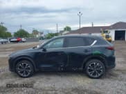 ✅ 2023 Mazda CX-5 S Premium Plus • VIN: JM3KFBEM9P0125871 • Лот: 43088388. Опубликован ранее на IAAI с пробегом 31 690 миль. Бесплатный доступ к архиву аукционных продаж из США и подробный отчёт об истории автомобиля на DreamBid. Изображение 14.