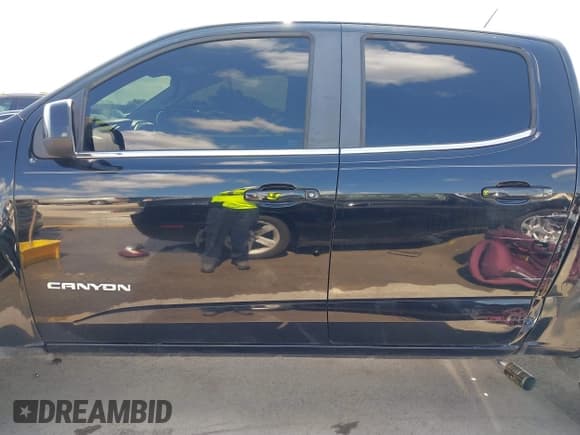 ✅ 2016 GMC Canyon 2WD SLE • VIN: 1GTG5CE3XG1160847 • Lot: 43287308. Listed on IAAI with 141,323 mi. Free auction sales archive from the USA and detailed vehicle history report at DreamBid. Image 14.