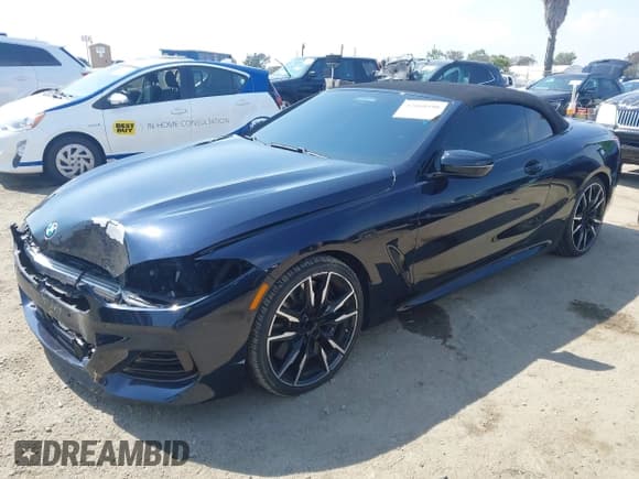 ✅ 2023 BMW 8 Series M850i xDrive • VIN: WBAFY4C07PCK10123 • Lot: 42160590. Listed on IAAI with 18,801 mi. Free auction sales archive from the USA and detailed vehicle history report at DreamBid. Image 2.