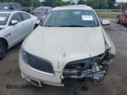 ✅ 2014 Lincoln MKS • VIN: 1LNHL9EK3EG602023 • Лот: 42830966. Опубликован ранее на IAAI с пробегом 91 033 миль. Бесплатный доступ к архиву аукционных продаж из США и подробный отчёт об истории автомобиля на DreamBid. Изображение 12.