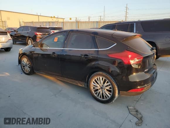 ✅ 2018 Ford Focus Titanium • VIN: 1FADP3N24JL283274 • Лот: 82455005. Опубликован ранее на Copart с пробегом 163 477 миль. Бесплатный доступ к архиву аукционных продаж из США и подробный отчёт об истории автомобиля на DreamBid. Изображение 2.
